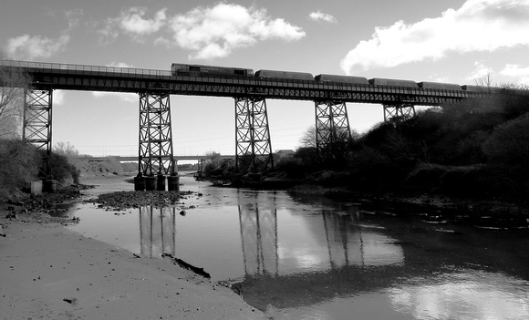 66722 passes over the "Black Bridge" River Blyth with Fastline Hoppers.