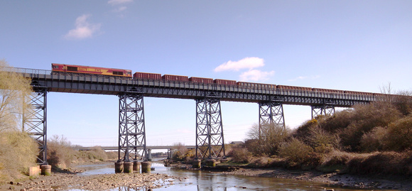66079 "James Nightall G.C" passes over the Black Bridge.
